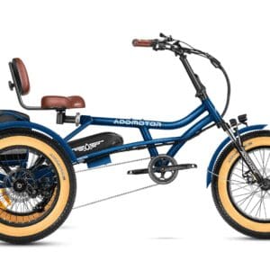 A blue tricycle with two seats and a handle bar.