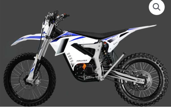 White and blue Kollter electric dirt bike.