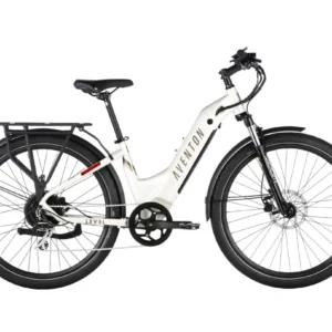 A white bicycle with black wheels and red accents.