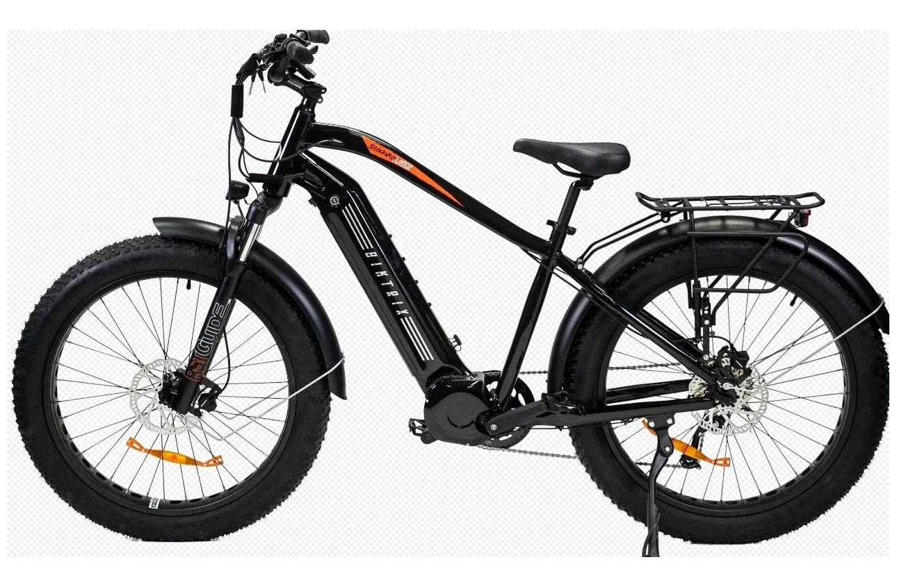 A black and orange electric bike is parked