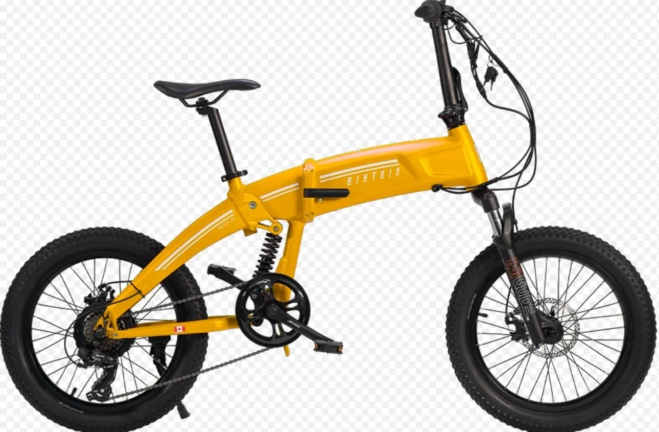 A yellow folding bike is parked on the ground.